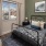 Bedroom with natural lighting and high ceilings
