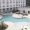 pool with modern stonework and reclining seats